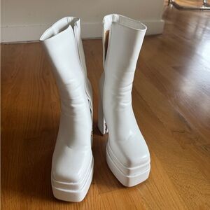 White platform heeled boots size 7. Very similar to “gogo” boots